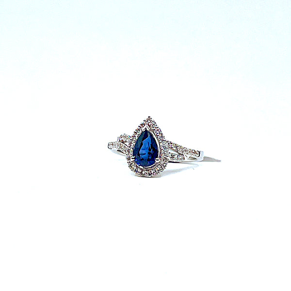 18 Karat white gold pear shapped sapphire ring with .50 carats of diamonds 200-00287