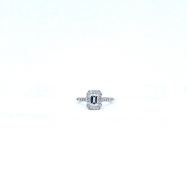 14 Karat white gold emerald cut diamond halo engagement ring with .94 carat VS1/G